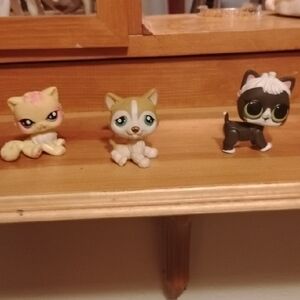 Littlest Pet Shop Yellow, Brown, and Black Pet Figures